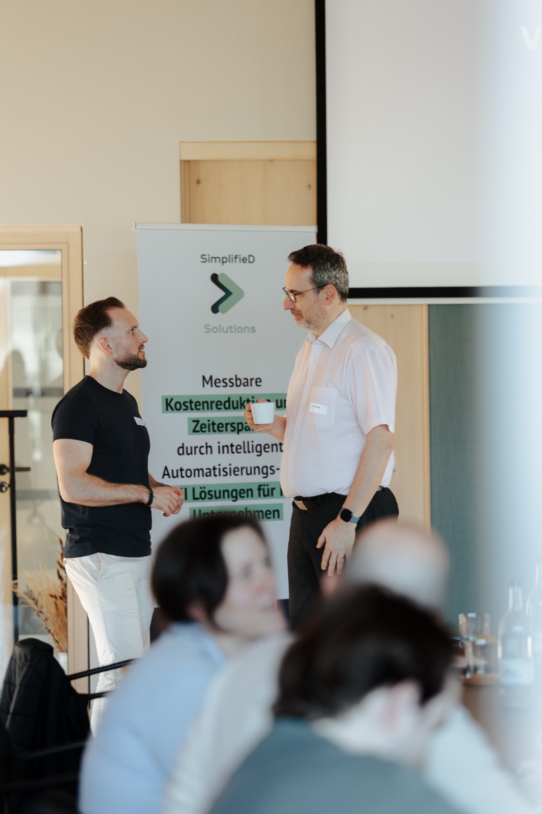 Gabriel Michelberger in conversation with a participant